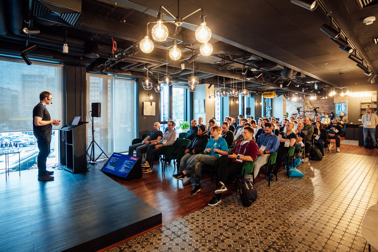 Speaker with audience in venue room